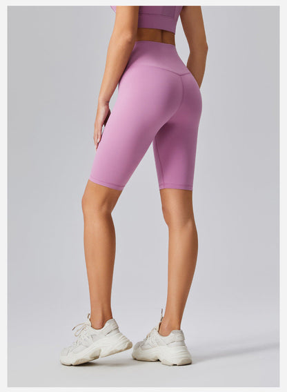Pantalones cortos de yoga de cintura alta de color liso para mujer