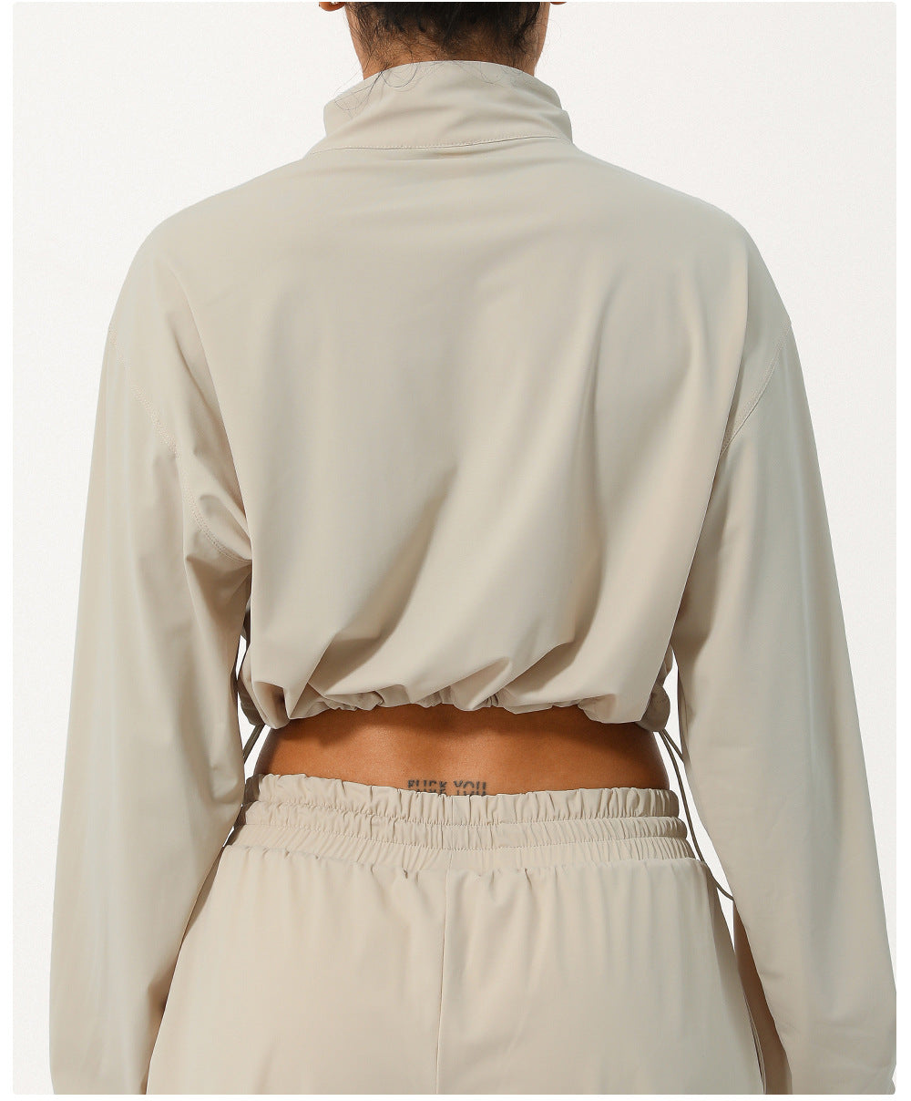 Veste de yoga décontractée à col montant et demi-fermeture éclair pour femme