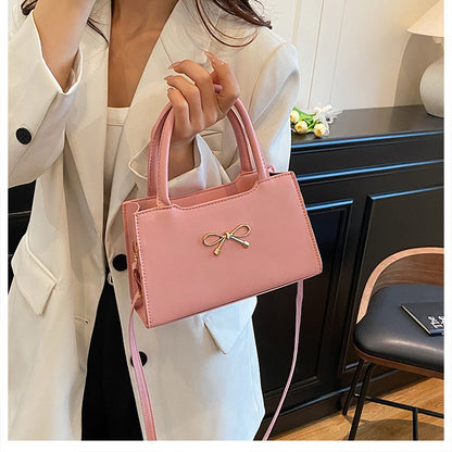 Bolso de mano informal de PU de color sólido con hebilla de lazo para mujer