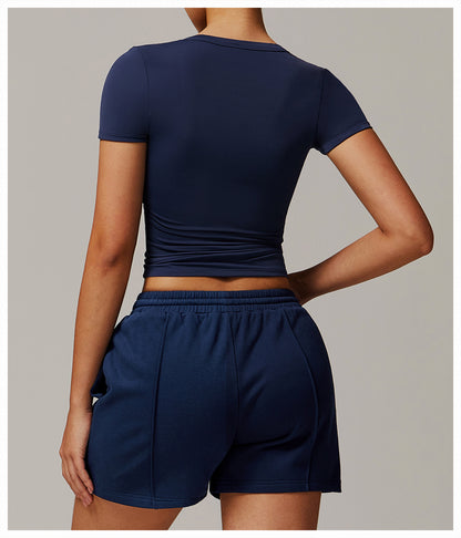Camiseta de yoga informal de color liso con cuello en V para mujer