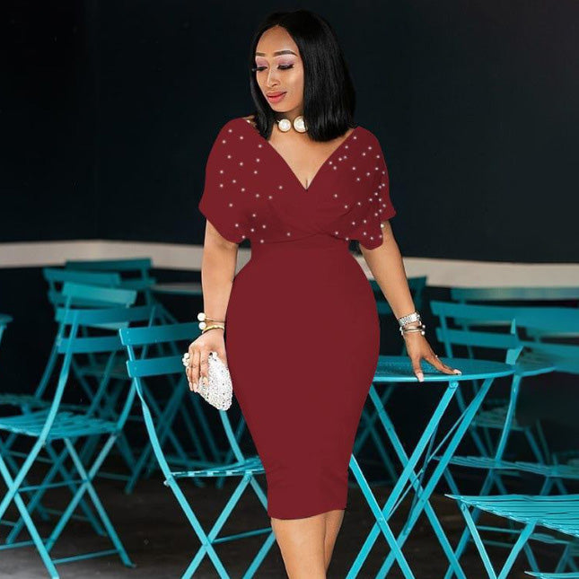 Elegante vestido midi con escote en V y cuentas de color liso