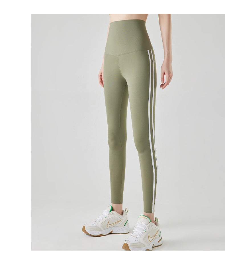 Leggings de sport à rayures et coutures tendance pour femmes