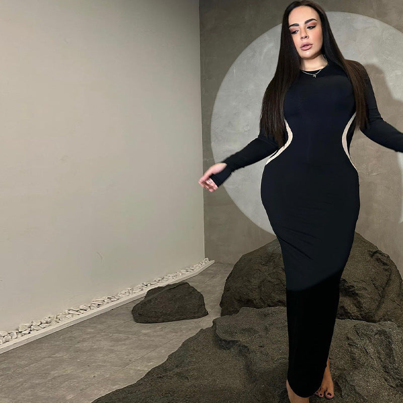 Vestido largo de manga larga con cuello redondo y cintura definida para mujer